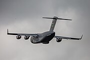 A Boeing C-17 Globemaster III, tail number 95-0103, taking off from RAF Mildenhall in the United Kingdom. It is assigned to the 62nd Airlift Wing and the 446th Airlift Wing at Joint Base Lewis McChord in Washington, USA.