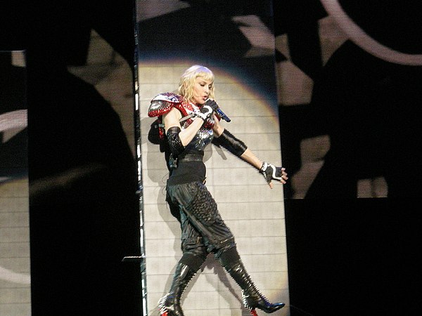 Madonna performing Hard Candy's lead single, "4 Minutes", during the Sticky & Sweet Tour