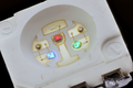Fotografia unui LED SMD RGB 5050, se observă cele trei pastile LED, câte una pentru fiecare culoare