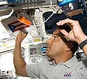 Acaba with Puerto Rican Flag aboard STS-119