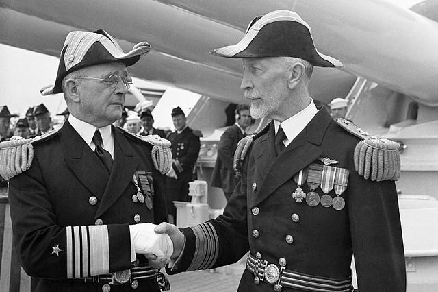 Admiral Arthur Japy Hepburn, left, assuming command of United States Fleet from Admiral Joseph M. Reeves, June 24, 1936.