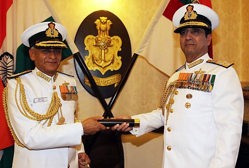 Admiral R. K. Dhowan, the outgoing CNS, handovers the traditional telescope of the CNS to Admiral Lanba as he takes charge as the chief at Naval Headquarters, New Delhi, on 31 May 2016.