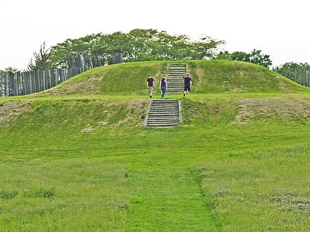 The largest platform mound at Aztalan, with modern reconstructions of steps and stockade