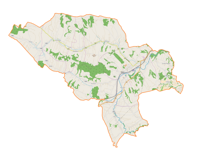 Mapa konturowa gminy Biecz, blisko centrum na prawo znajduje się punkt z opisem „Kolegiata Bożego Ciała w Bieczu”