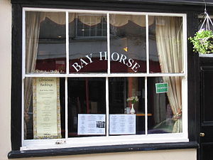 Exceptionally wide sash window (approximately two metres or 6.6 feet wide) in a pub in Bromyard, Herefordshire, England BigSashWindowBromyard.jpg