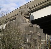 One of four Monumental lions that stand at each corner of Britannia Bridge. Britannia Bridge lion.jpg