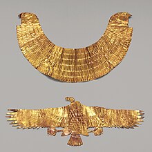 Incised sheet gold broad collar with falcon-headed terminals and vulture pectoral Broad Collar with Falcon-Head Terminals MET 21X CAT132R3.jpg