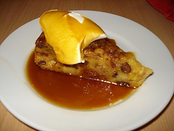 The traditional Sammarinese Christmas cake 'Bustrengo' prepared with polenta, honey, nuts and dried fruit. Bustrengo.jpg