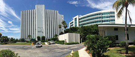 Collier County's main administration building, left, and the back end of the county courthouse, right.