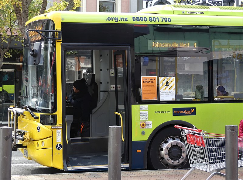 File:Covid-19 'Alert Level 2' notices on bus.jpg