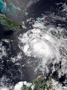 A weakened Tropical Storm Elsa south of Haiti on July 3 Elsa 2021-07-03 1800Z.jpg