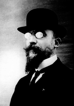 Satie wearing a bowler hat and wing collar