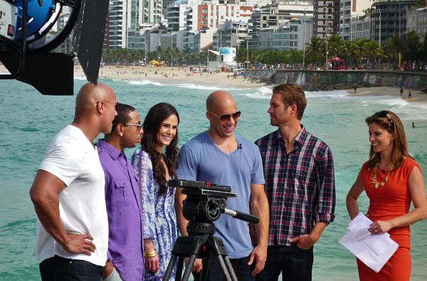 Brewster (third from left) with the cast of Fast Five in 2011