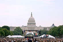 The university's commencement ceremony on the National Mall in front of the U.S Capitol GWUCommencement.jpg