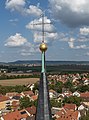 * Nomination Cross on the north tower of the Catholic Town Parish Church of St. Maria de Rosario and St. Regiswindis in Gerolzhofen , aerial view. --Ermell 07:02, 7 September 2021 (UTC) * Promotion  Support Good quality. Alexander Novikov 08:09, 7 September 2021 (UTC)