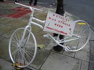 Ghost bike in London, 2005 - a stripped down frame and tireless wheels help deter theft Ghostcycle-2005.jpg