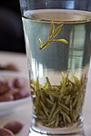 Green tea longjing in glass.jpg