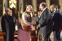 (L-R) President Pranab Mukherjee, Prime Minister Narendra Modi, Prime Minister of Pakistan, Nawaz Sharif and Prime Minister of Mauritius, Navin Ramgoolam. Handshake between Narendra Modi and Nawaz Sharif.jpg