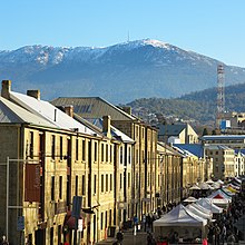 Salamanca Market with the snow-capped Mount Wellington in the background Hobart Tasmania Salamanca Place.jpg
