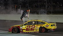 Joey Logano won the 2018 Monster Energy NASCAR Cup Series Championship. Joey Logano Championship Celebration 2018.jpg