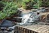 Kbal Spean river bed carvings of Lingas and Vishnu