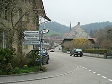 Road with traffic signs in the outskirts of Bern, Switzerland Lutzelfluh-Goldbach3.jpg