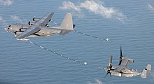 Lockheed MC-130P 66-0215 of the 67th SOS refuels a Bell Boeing CV-22B Osprey of the 7th Special Operations Squadron, 24 January 2014. Last 67th SOS MC-130P refuels CV-22 in January 2014.jpg