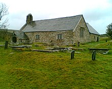 A view from the south-east, by the gate Llangelynnin church and porch.jpg