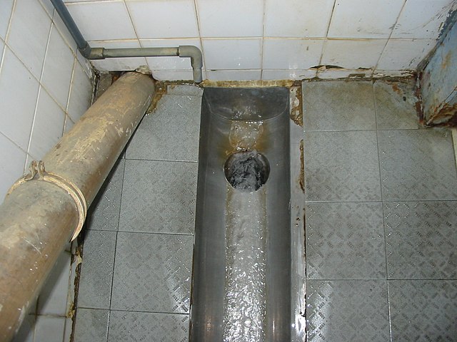 Old-style squat toilet (Hong Kong)