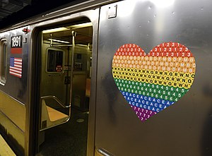 The New York City Subway system commemorated Stonewall 50 - WorldPride NYC 2019 with heart-shaped rainbow logos representing LGBTQ pride, celebrating the largest LGBTQ event in history, with five million attendants in Manhattan for Pride weekend alone. MTA x WorldPride 2019 - 48055782951.jpg