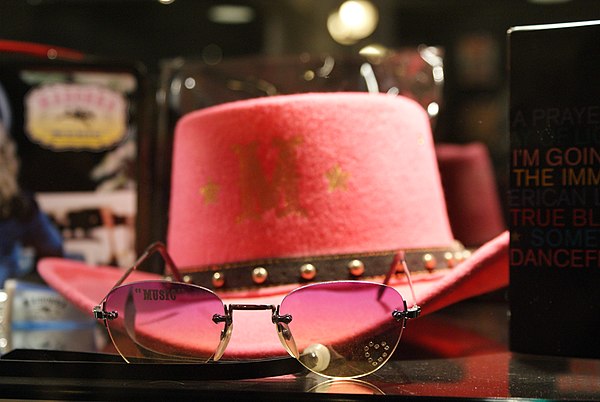 A cowgirl hat and pink shades, two of the various promotional items produced to support the album's release.