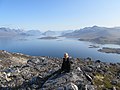Mandy and Tasermiut Fjord from atop Quassik Peak near Nanortalik Greenland.jpg