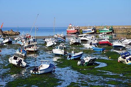 Boats at low tide in the harbour of Barfleur (Basse-Normandie, France)