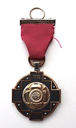 Pictorial depiction of Padma Vibhushan medal in golden colour with its pink ribbon