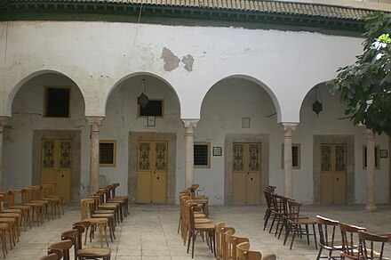 Courtyard of the madrasa Medersa Achouria Interieur.JPG