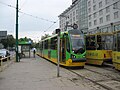 Polski: Tramwaj Moderus Beta MF 02 AC (#415) w Poznaniu na przystanku "Bałtyk" - linia nr 13 w kierunku Starołęki. Jest to pierwszy dzień liniowego kursowania tego typu pojazdu. English: Tram Moderus Beta MF 02 AC (#415) in Poznań at the "Bałtyk" stop - line 13 in the direction of Starołęka. This is the first day of the operation of this type of tram.