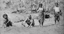 Bugkalot men and women clearing the ground for rice planting. PSM V77 D538 Ilongot men and women clearing the ground for rice planting.png