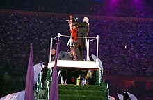 Lewis on stage with Jimmy Page at the closing ceremony of the 2008 Beijing Olympic Games. Lewis, Page and David Beckham represented Britain in the handing over segment for the 2012 Games to be held in London. Pagebeijing.jpg