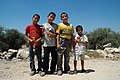 Palestinian children with slingshots.
