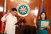 Robredo is sworn in by Duterte as HUDCC Secretary at the Malacanang Palace on July 12, 2016. Ph15-071316.jpg