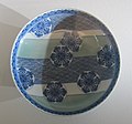 "Plate_with_snowflakes_on_waves._Imari,_1690_-1760._Musée_Guimet.jpg" by User:Ismoon