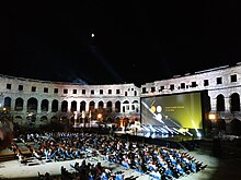 Pula Film Festival is held each year during summer. Its main stage is Roman amphitheatre in Pula. Pula Film Festival.jpg