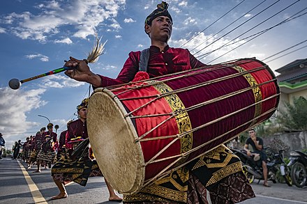 Gendang beleq performance on a road.