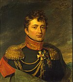 Painting shows a clean-shaven man with a cleft chin. He wears a dark green military uniform with a high, red collar, gold epaulettes and lace and a large medal shaped like a cross.