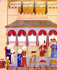 Sultan Selim II menerima Makna Lokman di Çorlu-Istana di Edirne. Makna Lokman adalah seorang penulis terkenal, yang dikenal untuk produksi "şahname", atau royal buku. Ottoman miniatur lukisan, dari "Şahname-ı Selim Han". Topkapı Sarayı Müzesi, Istanbul.