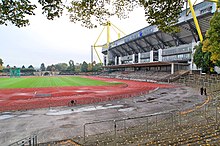 The Stadion Rote Erde, home of Borussia Dortmund from 1937 to 1974. The Westfalenstadion situated beside it features the largest terrace in Europe. Signal Iduna Park 2013 by-RaBoe 57.jpg