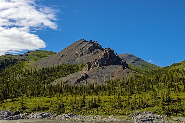 Mountain informally named "Stegosaurus Ridge" for its resemblance to the dinosaur, above the Firth River, in Canada's Ivvavik National Park.