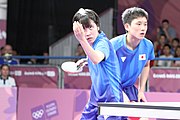 Deutsch: Tischtennis bei den Olympischen Jugendspielen 2018; Tag 9, 15. Oktober 2018; Mixed, Finale, Mixed-Doppel – Miu Hirano & Tomokazu Harimoto (JPN) gegen Sun Yingsha & Wang Chuqin (CHN) 1:3 English: Table tennis at the 2018 Summer Youth Olympics at 15 October 2018 – Mixed Final, Mixed-Double – Miu Hirano & Tomokazu Harimoto (JPN) Vs Sun Yingsha & Wang Chuqin (CHN) 1:3