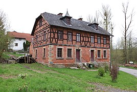 Una casa con entramado de madera en Tambach