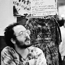 The BMUG T-shirt, for sale in the Berkeley Macintosh Users Group booth, MacWorld Expo Boston 1988, Raines Cohen in the foreground. The BMUG T-Shirt.jpg